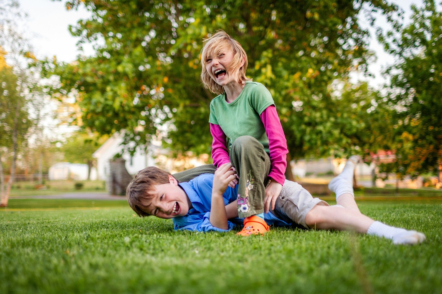 Children wrestling with each other